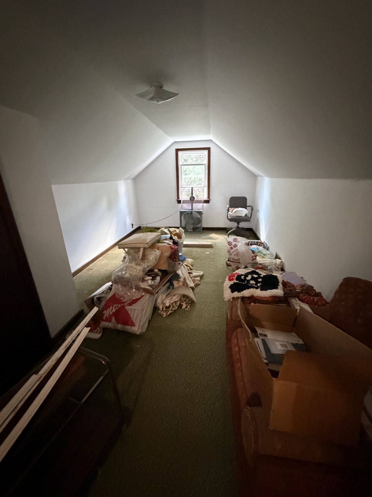 Attic room in a Linthicum Heights home before clean-out